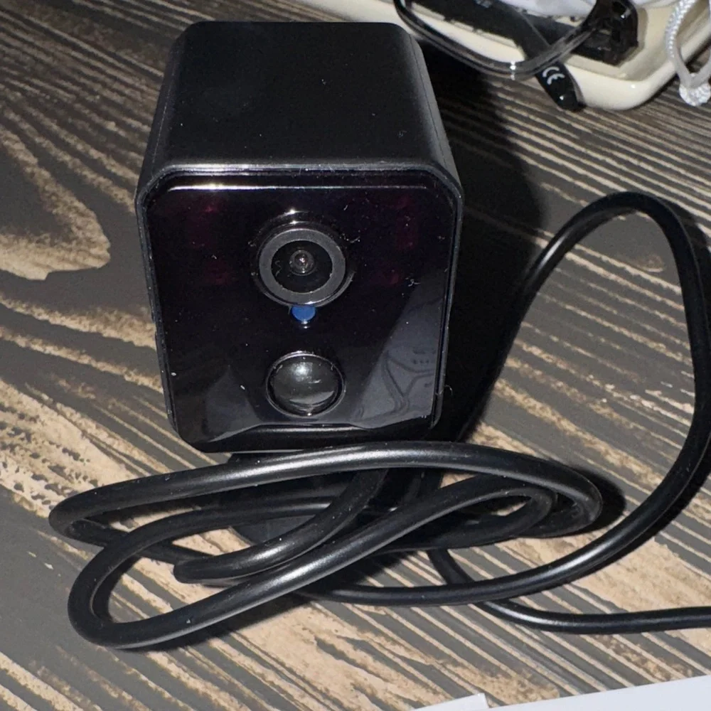 Compact Black Security Camera with Accessories